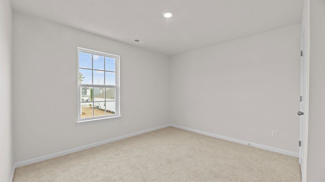 Spacious, unfurnished interior of a new home in West New Bern, New Bern (Image 17).