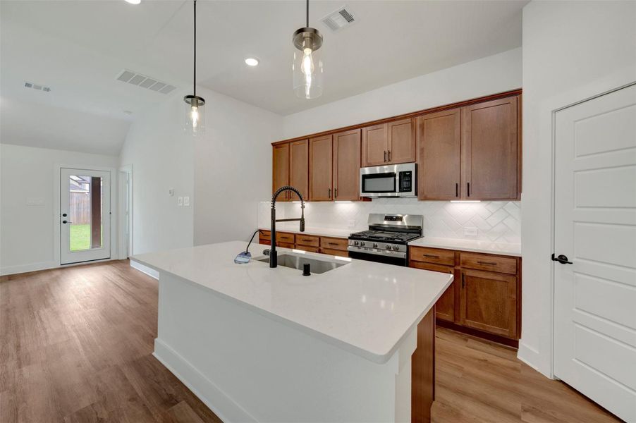 Furnished interior view inside a new home in Sorella, Tomball (Image 6).