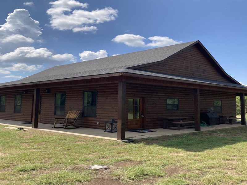 Front exterior of a new home in , Whitney, TX, highlighting curb appeal (Image 18).