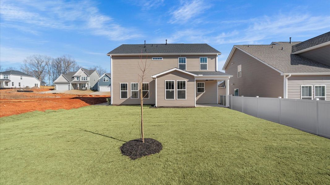 Exterior details and patio area of a home in Fox Hollow, Spartanburg (Image 21).