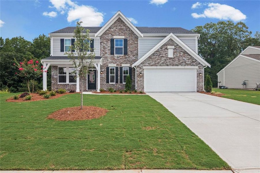 Front exterior of a new home in Pickens Bluff, Dallas, GA, highlighting curb appeal (Image 20).