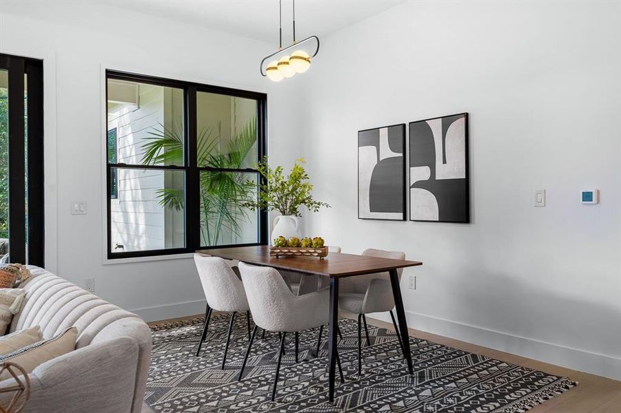 Foster culinary conversations in this dining room, where the welcoming atmosphere invites friends and family to savor not just delicious meals but also delightful company