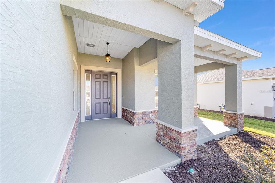 Exterior details and patio area of a home in On Top of the World Communities, Ocala (Image 26).