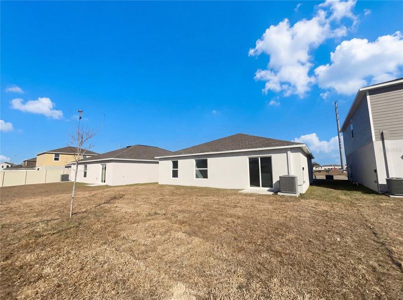 Exterior details and patio area of a home in Peace Creek Reserve, Winter Haven (Image 4).