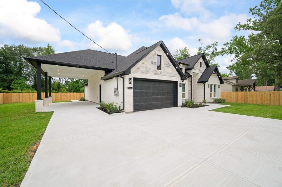 Front exterior of a new home in , Porter, TX, highlighting curb appeal (Image 24).