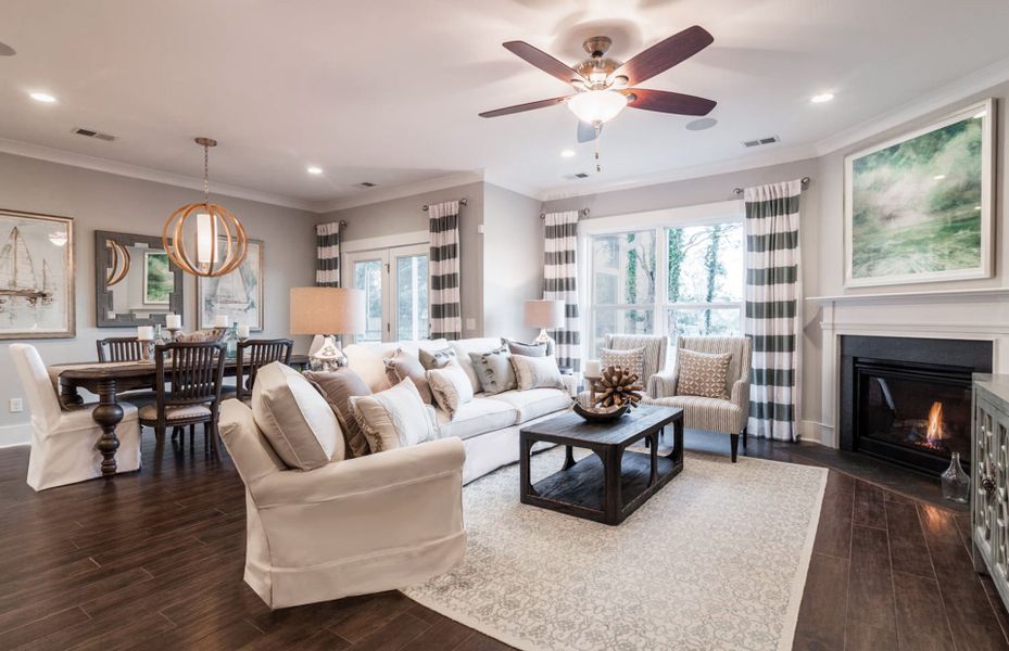 Open Gathering Room with ample space for entertaining  seamlessly flows into the Café.