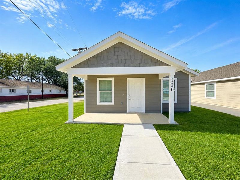 Front exterior of a new home in , Mineral Wells, TX, highlighting curb appeal (Image 1). Front exterior of a new home in , Mineral Wells, TX, highlighting curb appeal (Image 1).