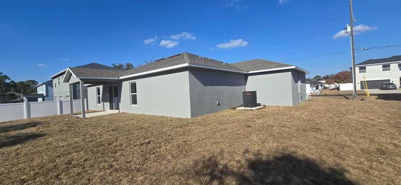 Exterior details and patio area of a home in , Poinciana (Image 3). Exterior details and patio area of a home in , Poinciana (Image 3).