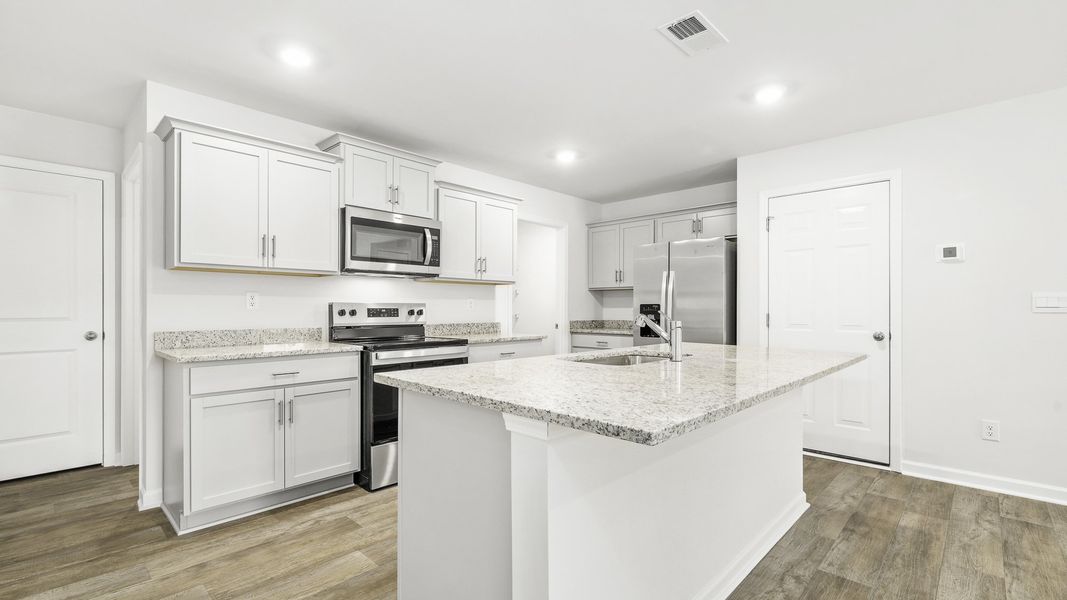 Furnished interior view inside a new home in Chandler Pointe, Rural Hall (Image 5).