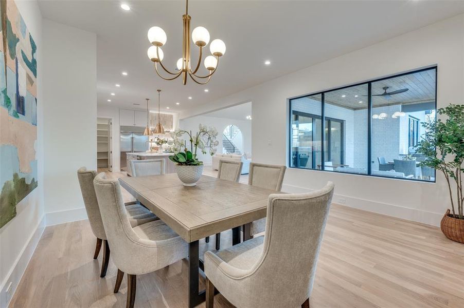 Dining area overlooks backyard