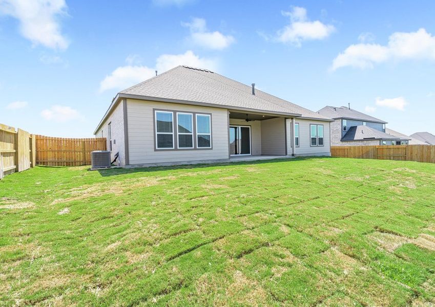 The back yard is fully fenced-in.