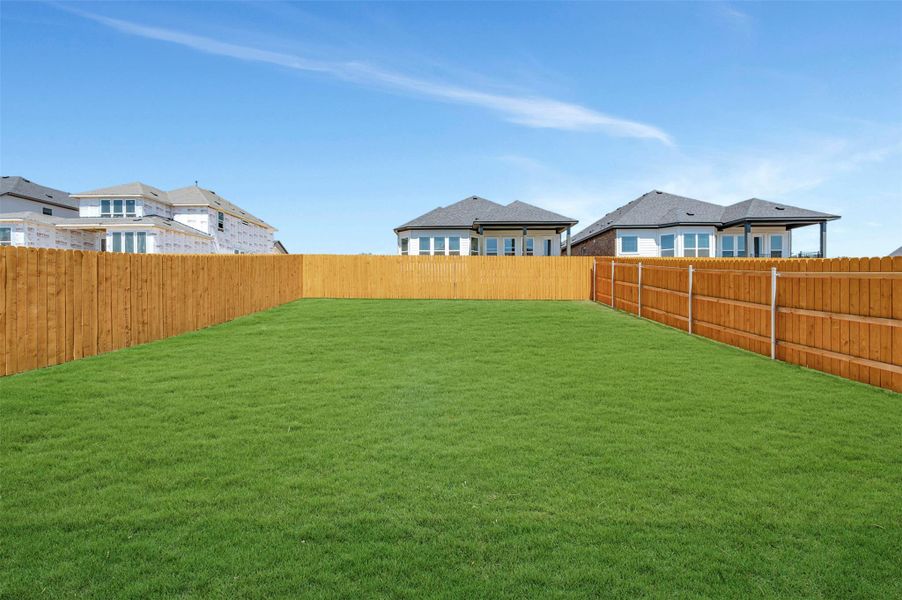 Exterior details and patio area of a home in Heritage, Dripping Springs (Image 4).