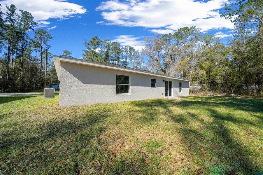 Exterior details and patio area of a home in , Citrus Springs (Image 19).