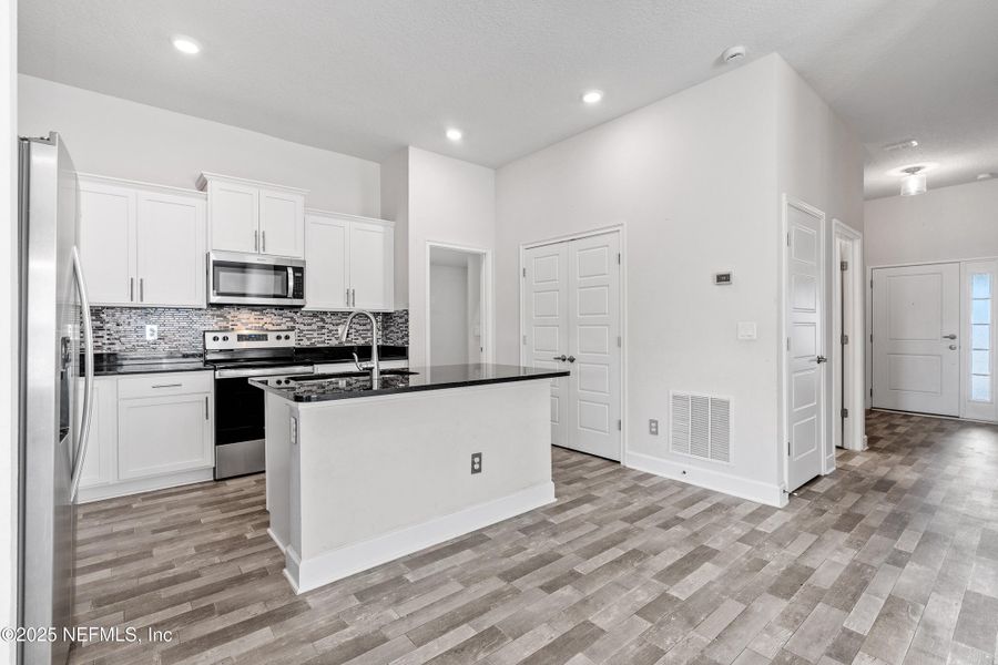 Furnished interior view inside a new home in Shadow Crest at Rolling Hills, Green Cove Springs (Image 6).