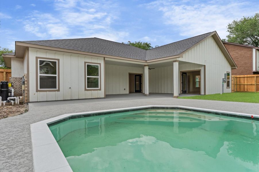 The patio seamlessly transitions to the pool decking with a french drainage system which moves any would be standing water away.