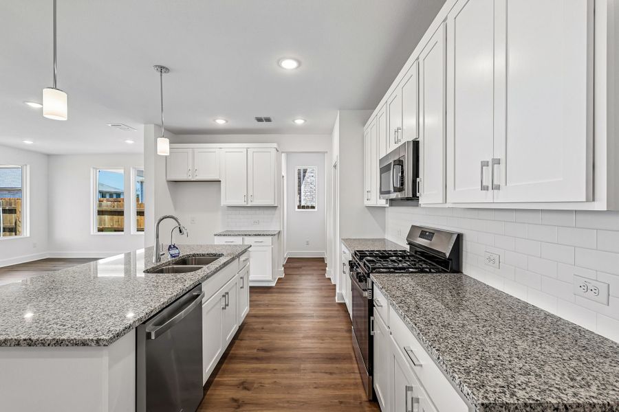 Furnished interior view inside a new home in Freedom at Anthem, Kyle (Image 7).