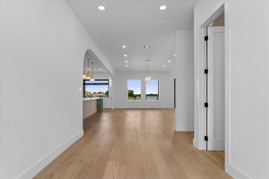 Walk into beautiful Lake views on 2nd floor. Powder room is first door on right