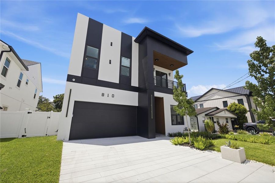 Front exterior of a new home in , Tampa, FL, highlighting curb appeal (Image 25). Front exterior of a new home in , Tampa, FL, highlighting curb appeal (Image 25).