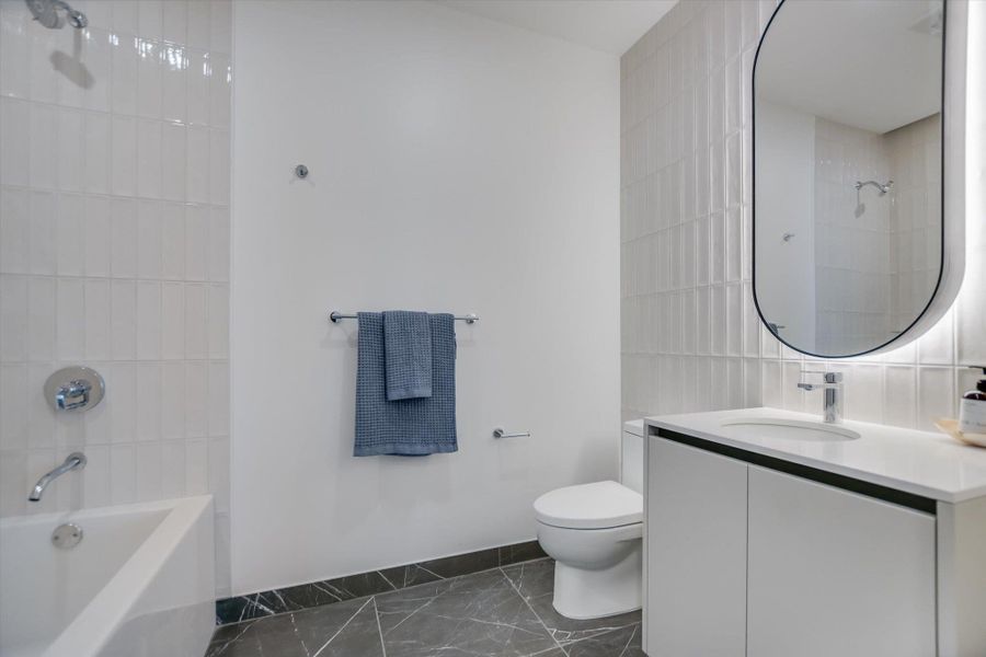 Photos shown are of the same floor plan 5 floors higher.