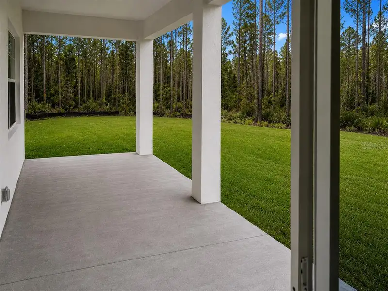 Exterior details and patio area of a home in , Ocala (Image 4).
