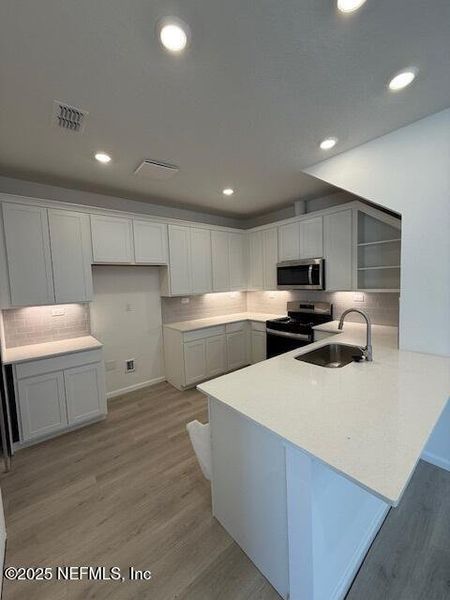 Furnished interior view inside a new home in Brook Forest - Villas, St. Augustine (Image 6).