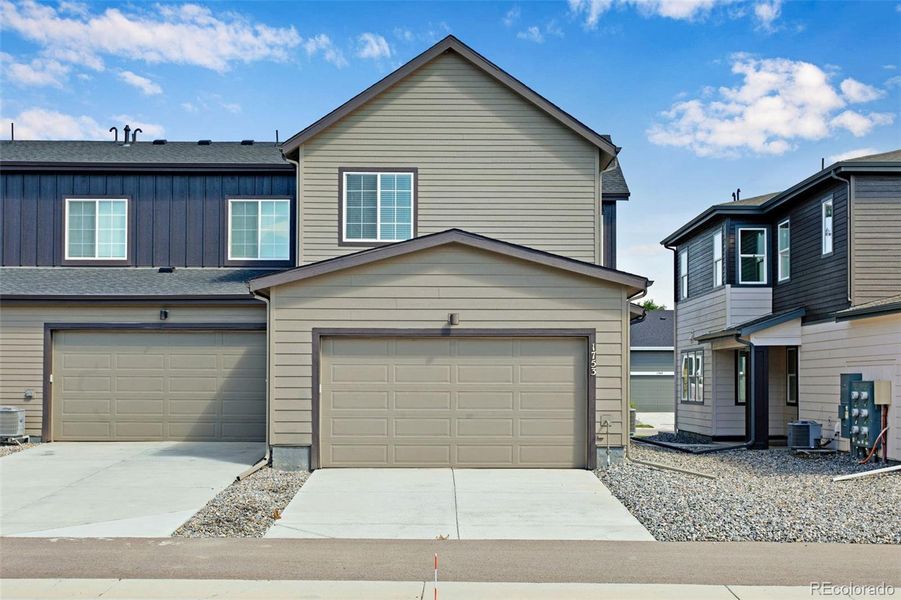 Front exterior of a new home in , Berthoud, CO, highlighting curb appeal (Image 22).