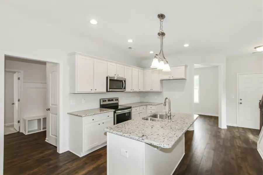 Representative furnished interior of a home built from the Furyk by RiverWILD Homes in Riverwood Ranch, Clayton (Image 8).