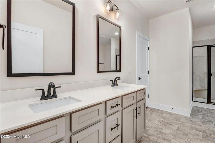 Furnished interior view inside a new home in East Lake, Leland (Image 3).