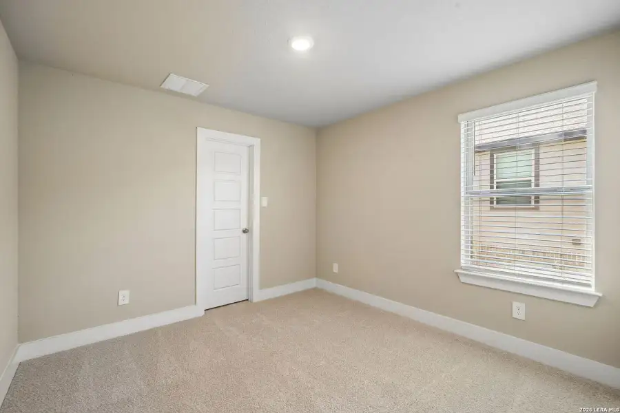 Spacious, unfurnished interior of a new home in Comanche Ridge, San Antonio (Image 22).