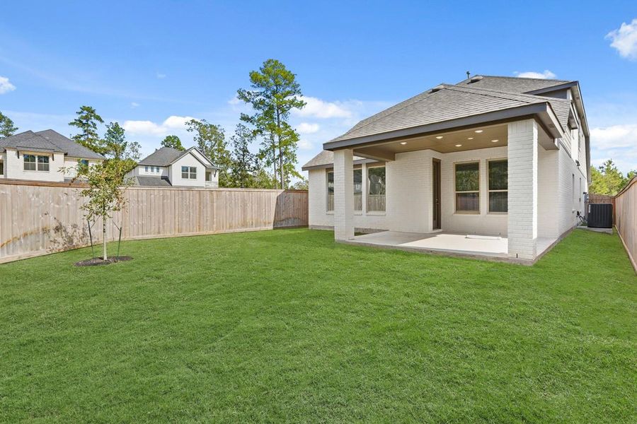 Exterior details and patio area of a home in Elyson: 55ft. lots, Katy (Image 2). Exterior details and patio area of a home in Elyson: 55ft. lots, Katy (Image 2).