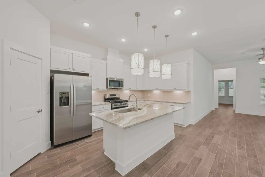Representative furnished interior of a home built from the Pommery by Chesmar Homes in Kresston, Montgomery (Image 3).