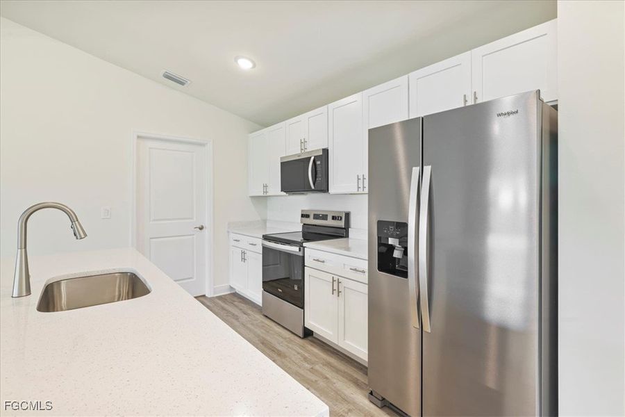 Furnished interior view inside a new home in Cape Coral, Cape Coral (Image 10).