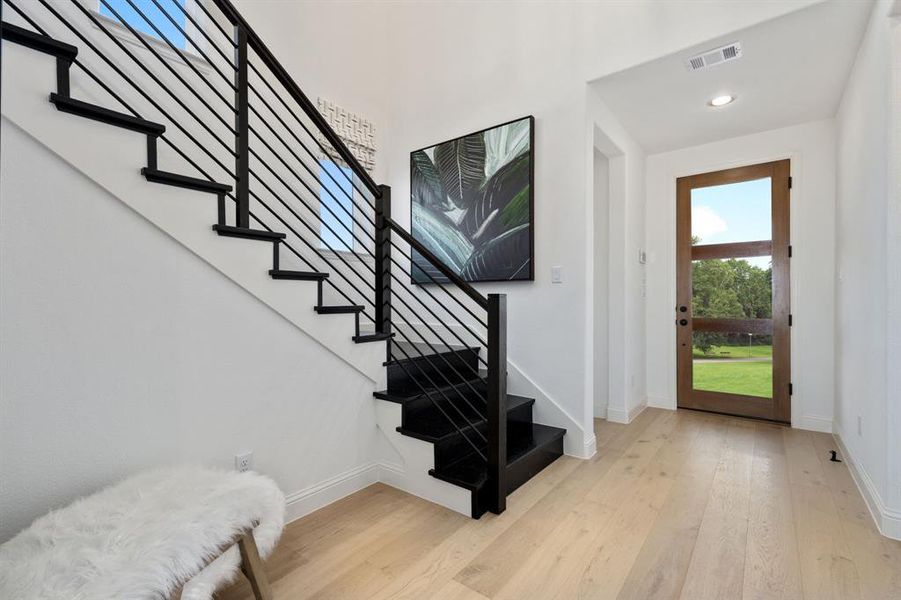 Foyer featuring light hardwood / wood-style flooring