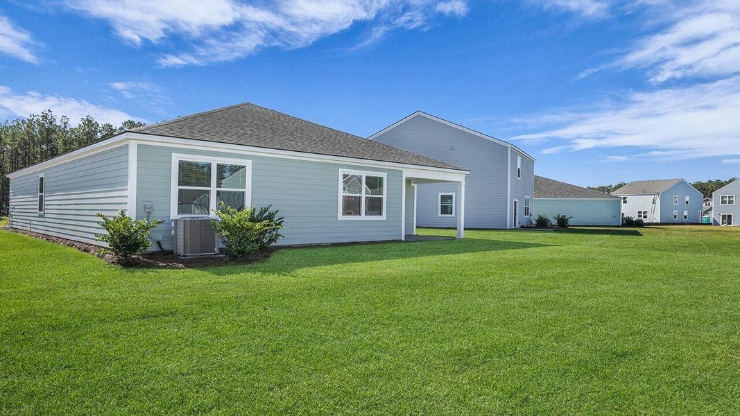 Exterior details and patio area of a home in Hillcrest, Ravenel (Image 19). Exterior details and patio area of a home in Hillcrest, Ravenel (Image 19).
