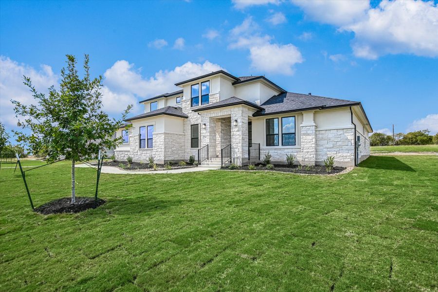 Representative exterior photo of a completed home built from the Vanderpool II by Giddens Homes in Whispering Wind, Bertram, TX (Image 33).