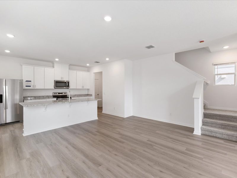 Dining room in the Ellison floorplan at 4621 Cross Prairie Parkway in The Meadow at Crossprairie