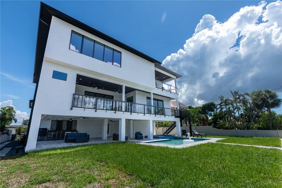 Front exterior of a new home in , St. Petersburg, FL, highlighting curb appeal (Image 26).