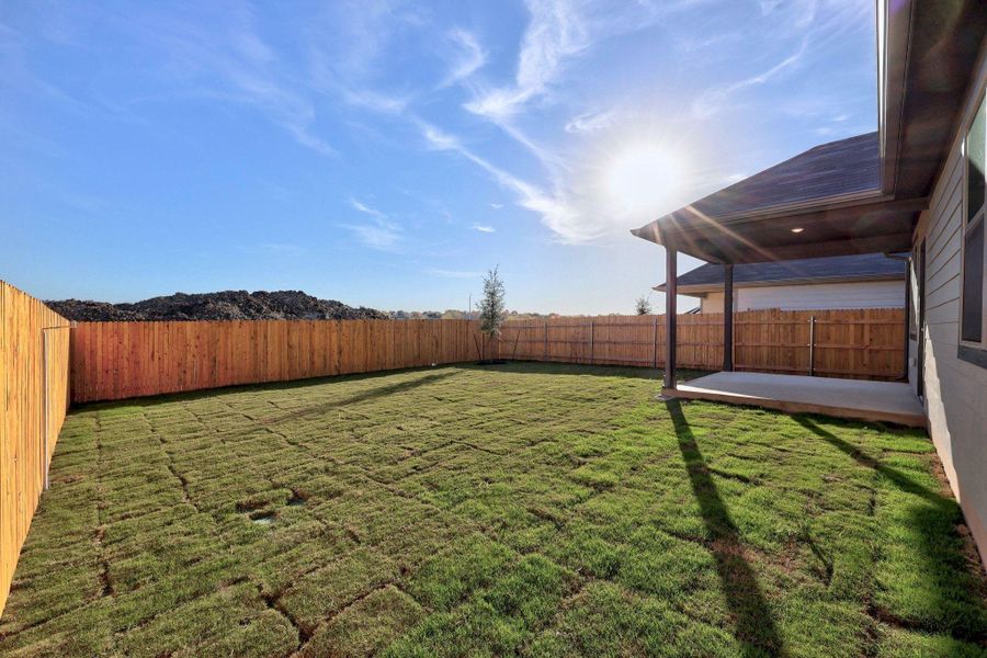 Exterior details and patio area of a home in Prairie Winds, Hutto (Image 20).