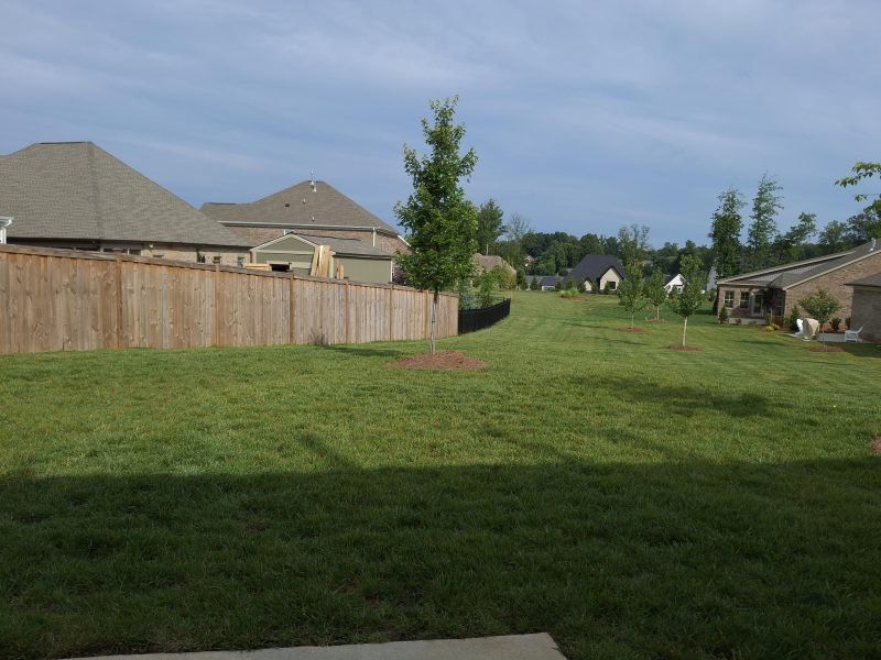 Exterior details and patio area of a home in Weybridge, Burlington (Image 30).