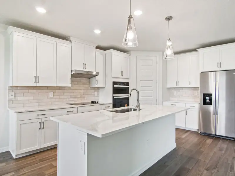 Furnished interior view inside a new home in Two Rivers - Signature Series, Zephyrhills (Image 4).