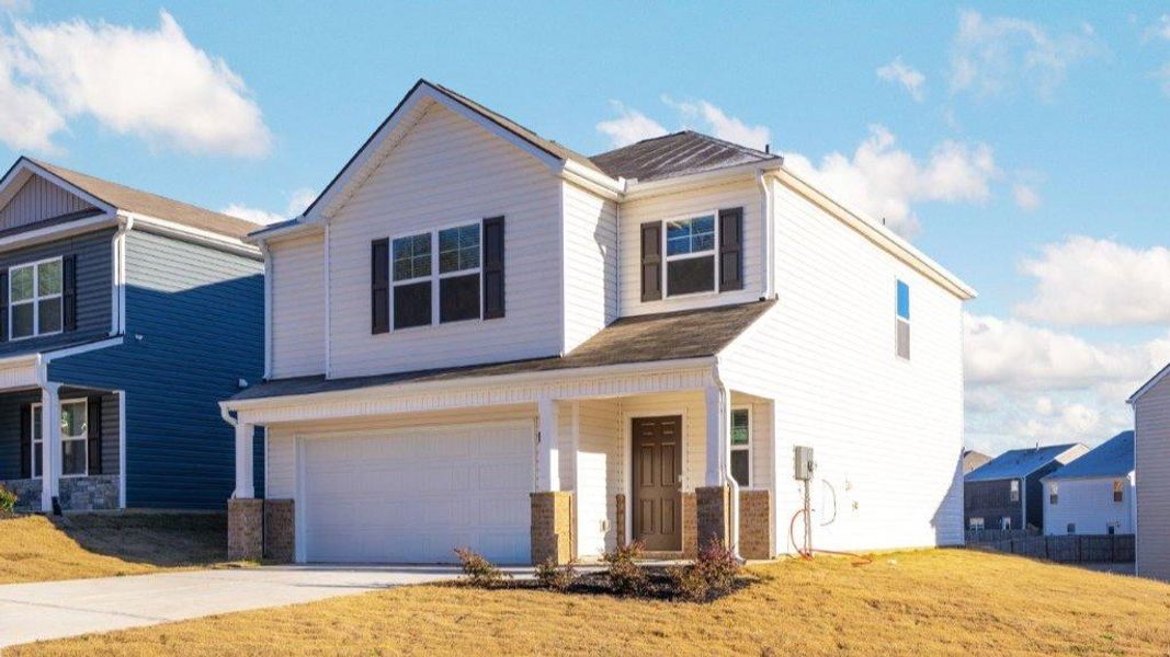 Front exterior of a new home in Hawk's Ridge, Rossville, GA, highlighting curb appeal (Image 22).