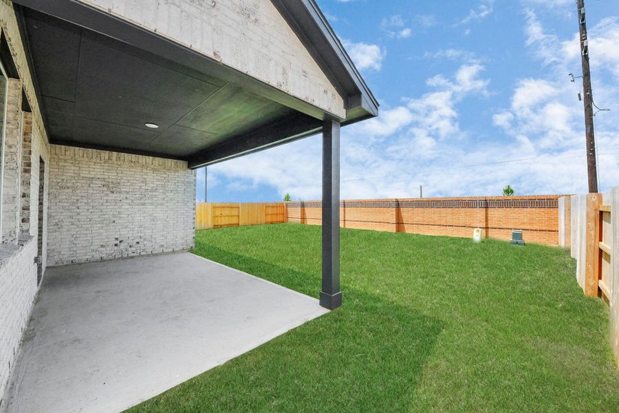 Exterior details and patio area of a home in 45' Traditional Homes at Elyson, Katy (Image 21).