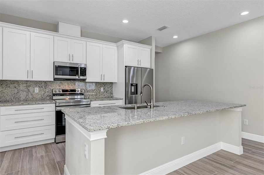Furnished interior view inside a new home in , Summerfield (Image 5).