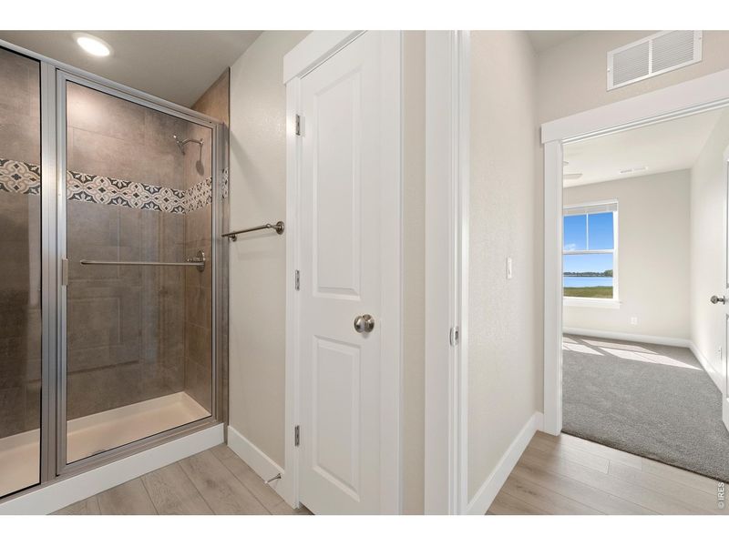 Furnished interior view inside a new home in The Lakes at Centerra, Loveland (Image 19).
