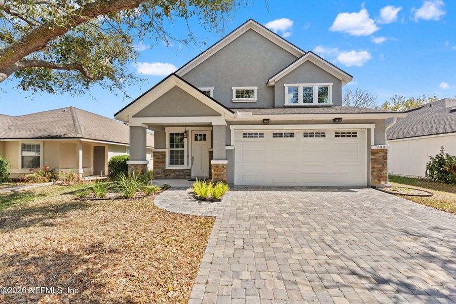 Front exterior of a new home in , Orange Park, FL, highlighting curb appeal (Image 25).