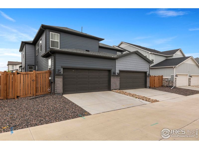 Front exterior of a new home in , Berthoud, CO, highlighting curb appeal (Image 20). Front exterior of a new home in , Berthoud, CO, highlighting curb appeal (Image 20).