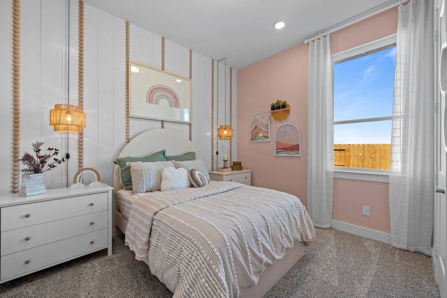 Representative furnished interior of a home built from the Bonneville by Chesmar Homes in University Heights, Round Rock (Image 12).