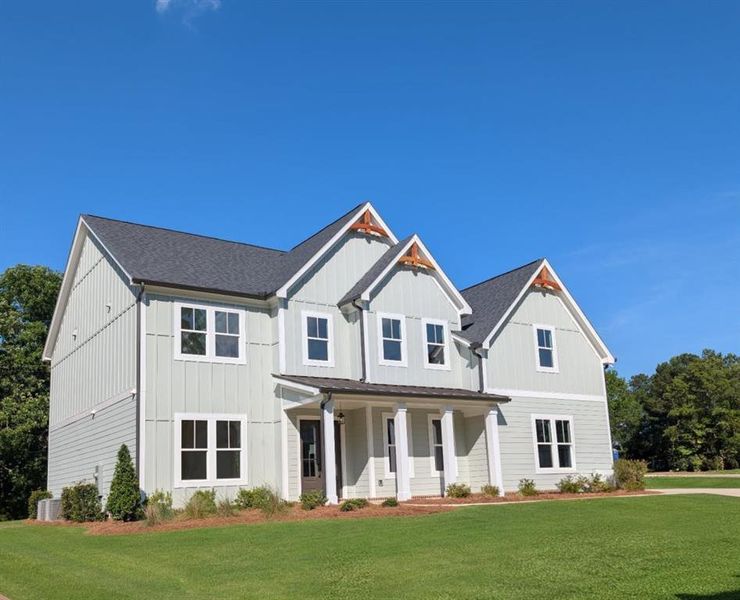 Front exterior of a new home in White Post on Lake Lanier, Gainesville, GA, highlighting curb appeal (Image 23).