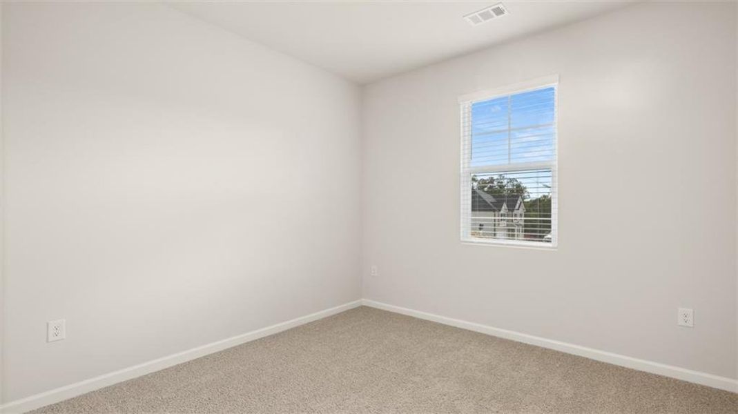 Spacious, unfurnished interior of a new home in Brooks Station, Dacula (Image 13).