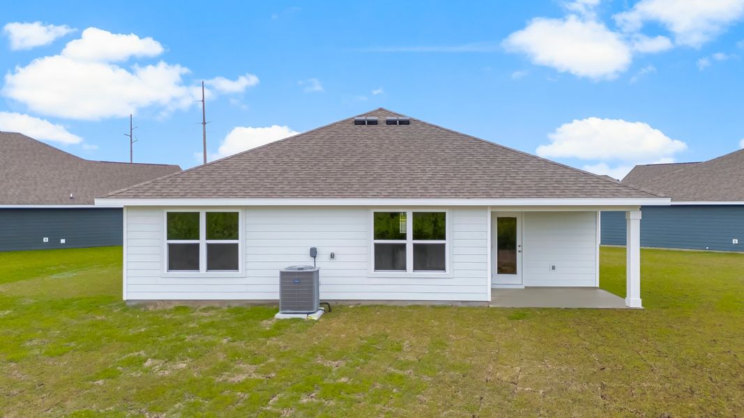 Representative exterior photo of a completed home built from the The Cali by D.R. Horton in Liberty, Panama City, FL (Image 18).